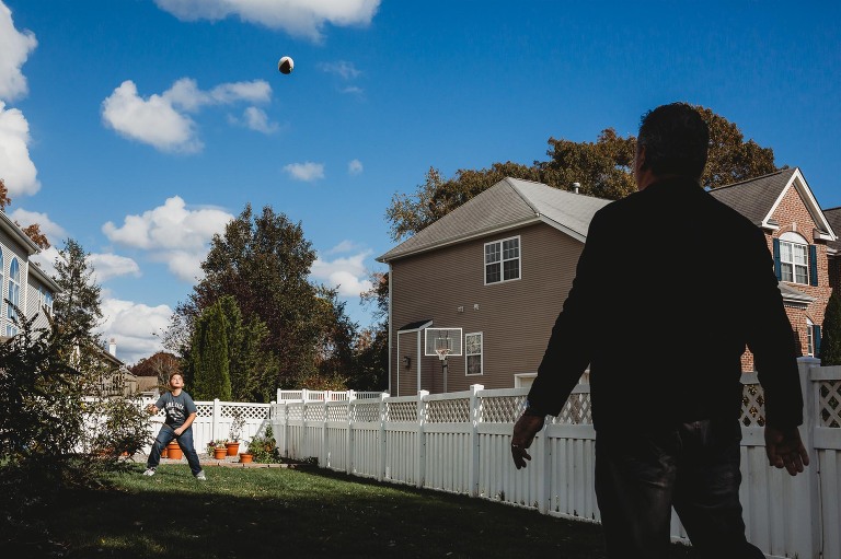 playing football in the back yard
