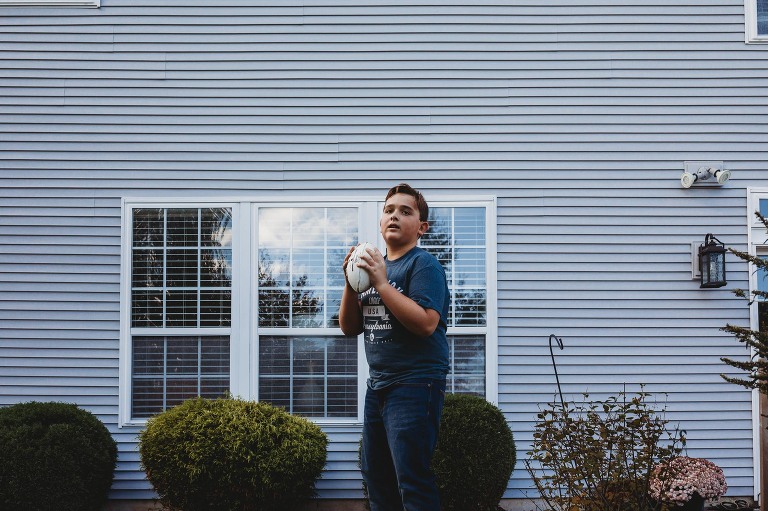 boy getting ready to throw a football