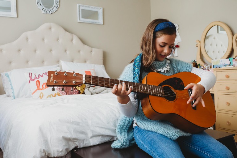 girl playing guitar
