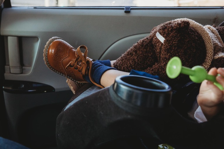 baby boy shoes and teddy bear