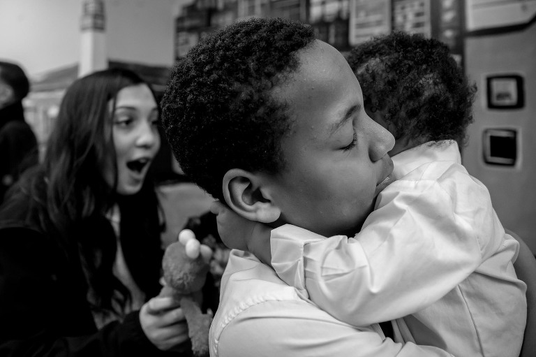 Boy hugging brother