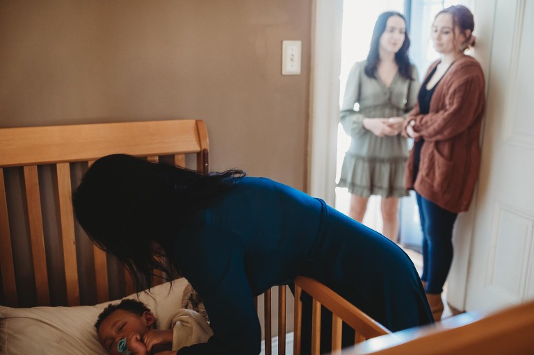 Mom waking up baby from nap