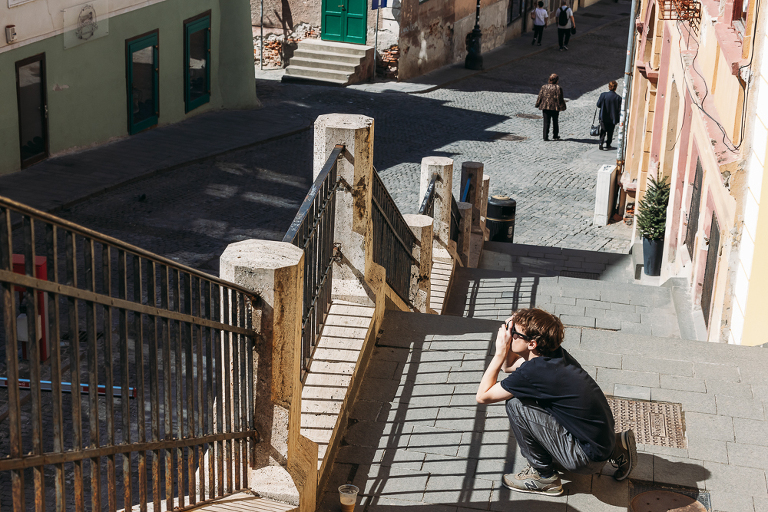 taking photos at the bridge of lies Sibiu Romania 